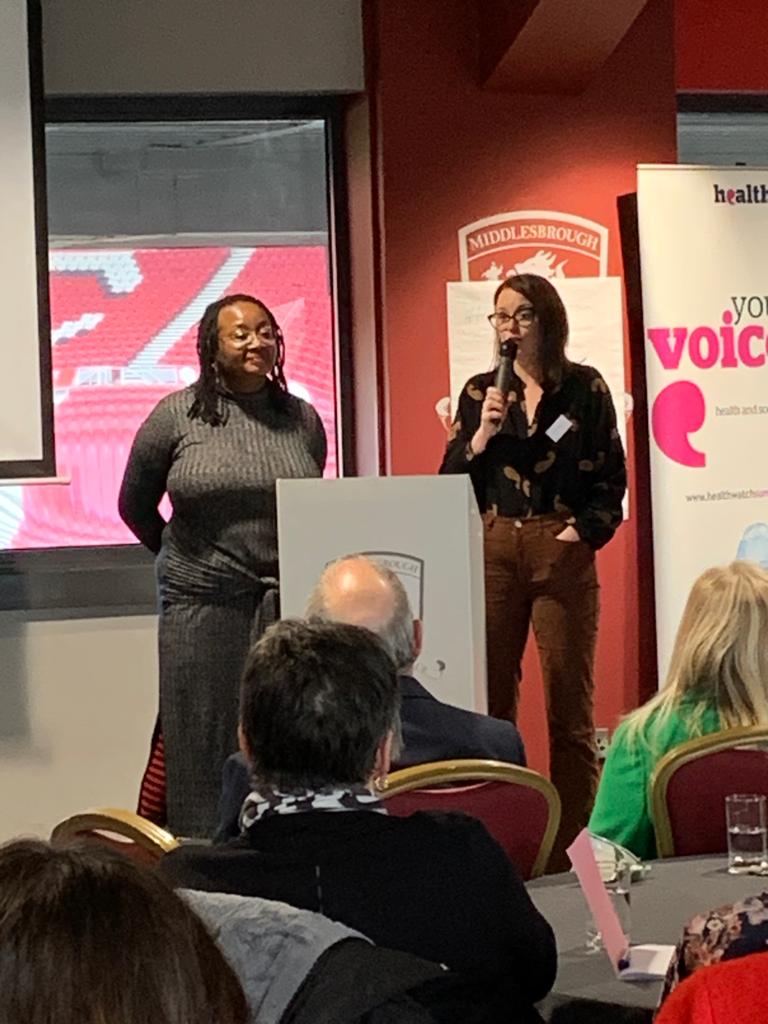 Image of Delana and Jenny from Healthwatch England speaking to the audience