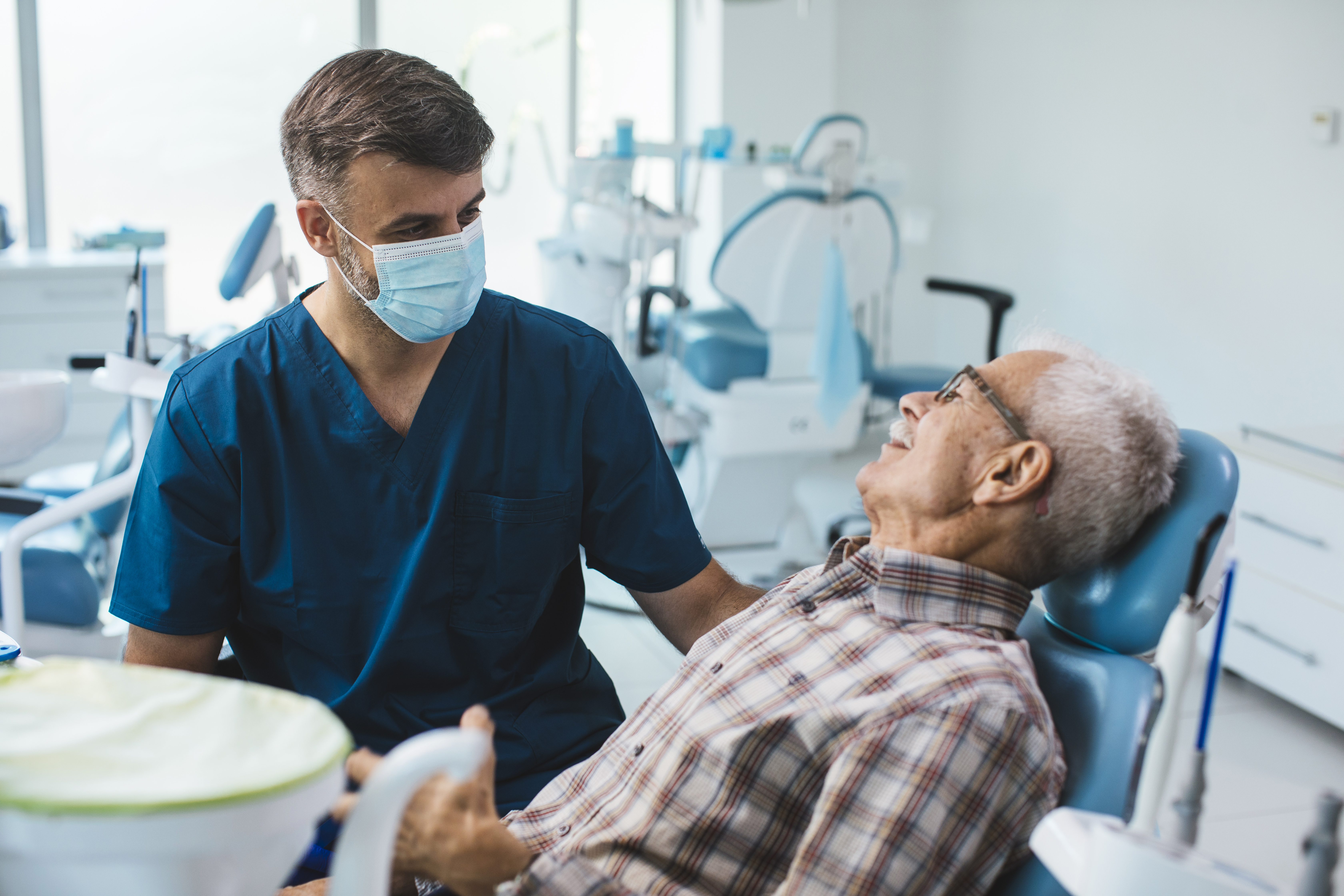 Image of dentist and patient