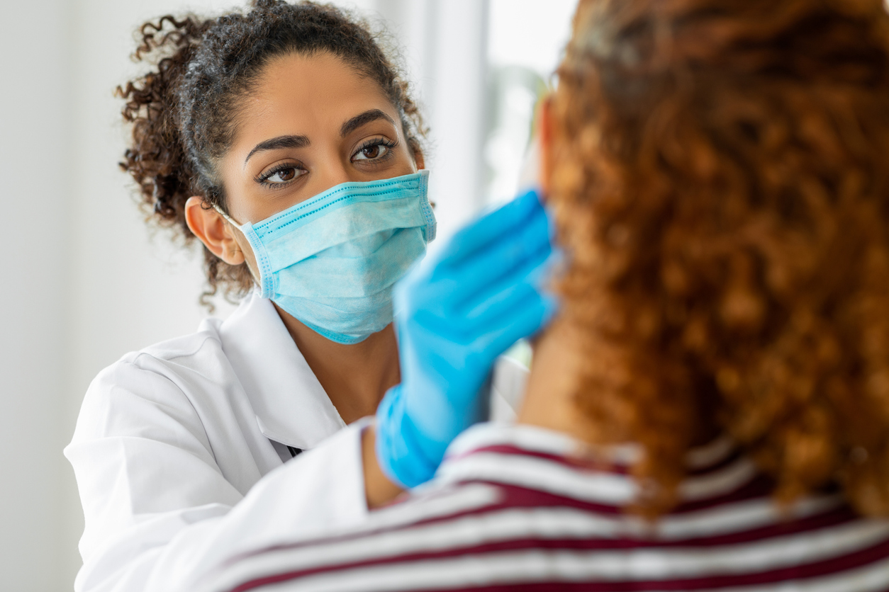 Image of doctor examining a patient