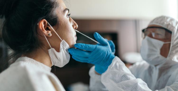 Image of a woman having a lateral flow test