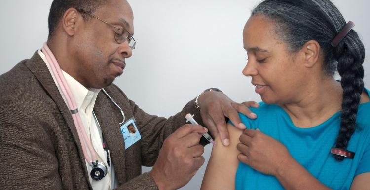 Image of person receiving a vaccine