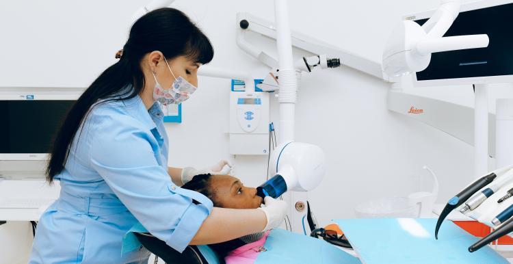 Image of dentist and patient
