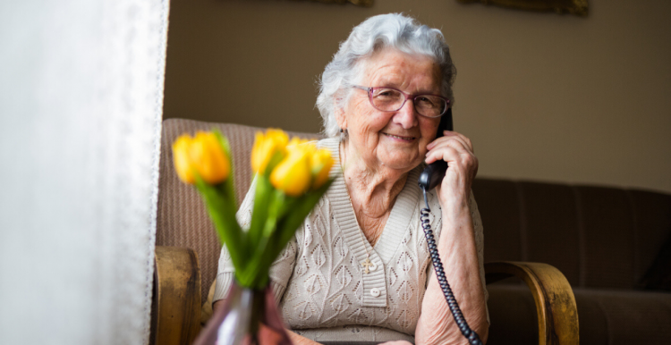 Image of elderly woman on the phone