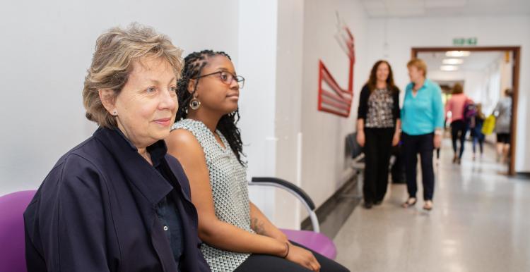 Image of woman sat in a hospital