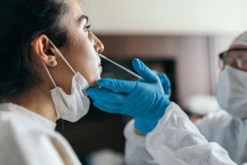 Image of a woman having a lateral flow test