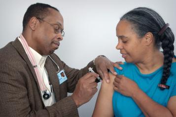 Image of person receiving a vaccine