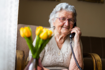 Image of elderly woman on the phone