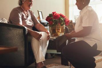 Image of a women and a carer