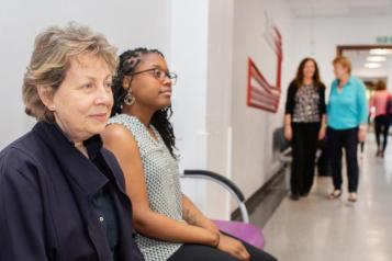 Image of woman sat in a hospital