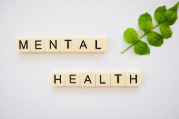 Image of scrabble tiles spelling out mental health