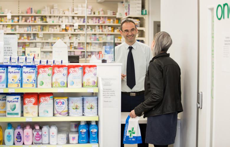 Image of a woman in a pharmacy